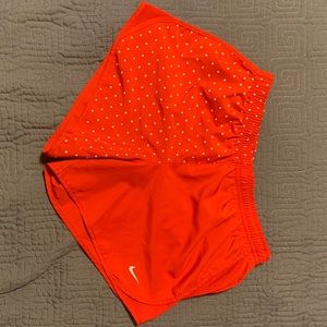 Girls red Nike Dri fit running shorts